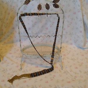 Black, white and gold beaded Y necklace with tassel